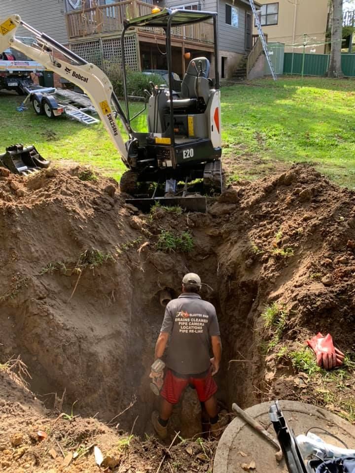 Jet Blaster Man's plumber doing tree root control