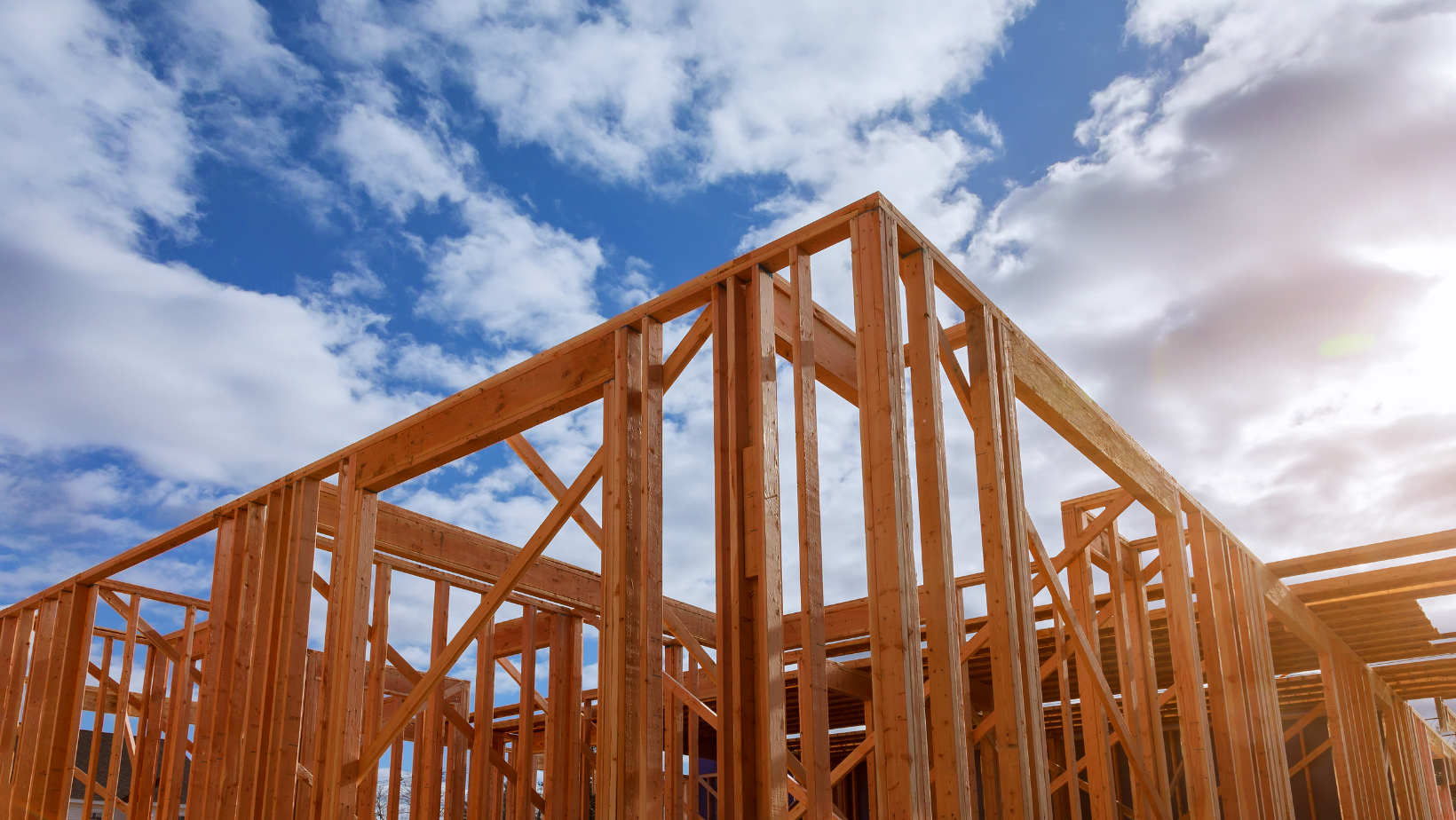 A row of refrigerators with glass doors in a supermarket