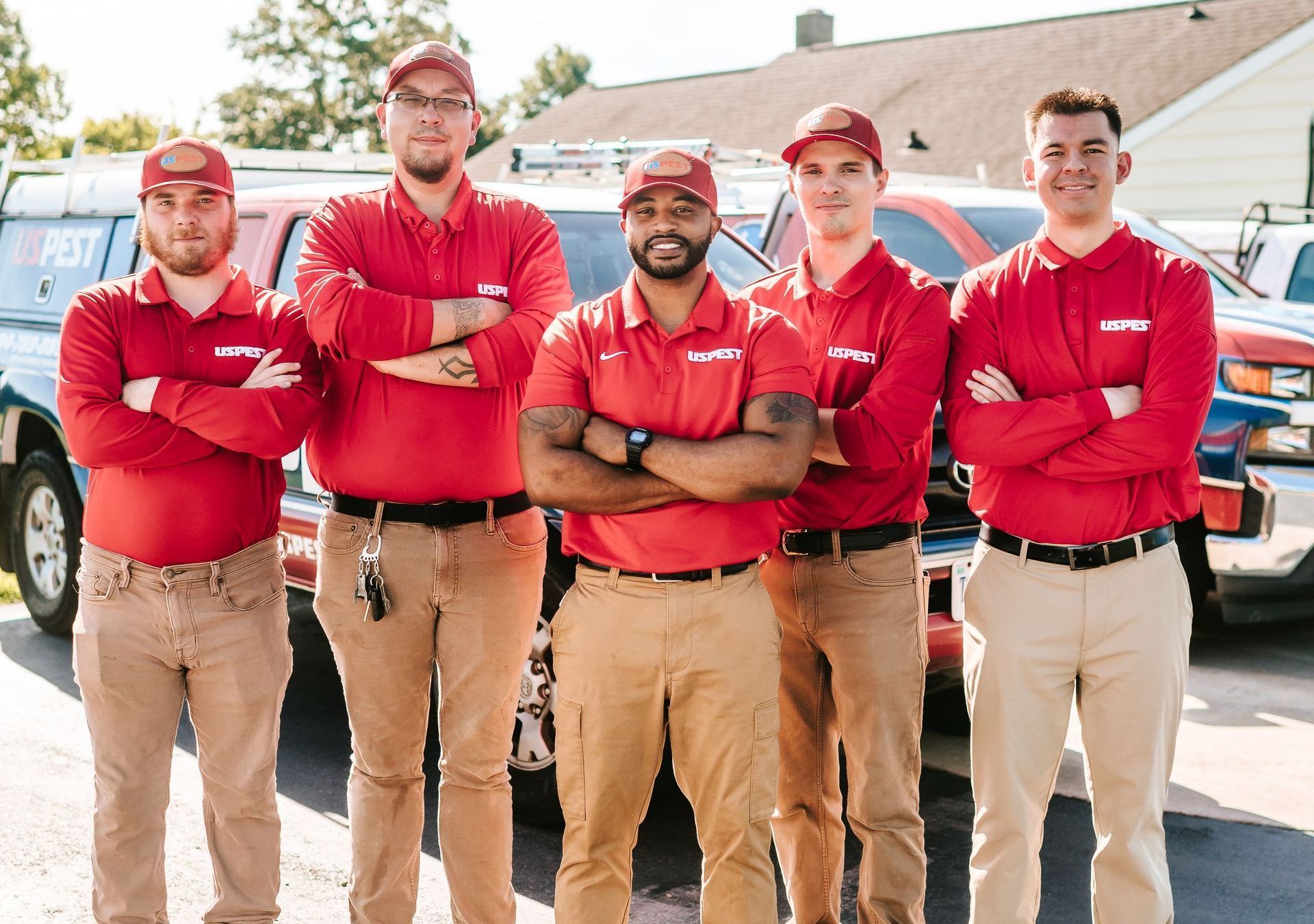 a group of people are sitting at desks in an office