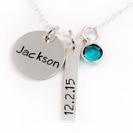 Silver necklace with charms: round engraved with 