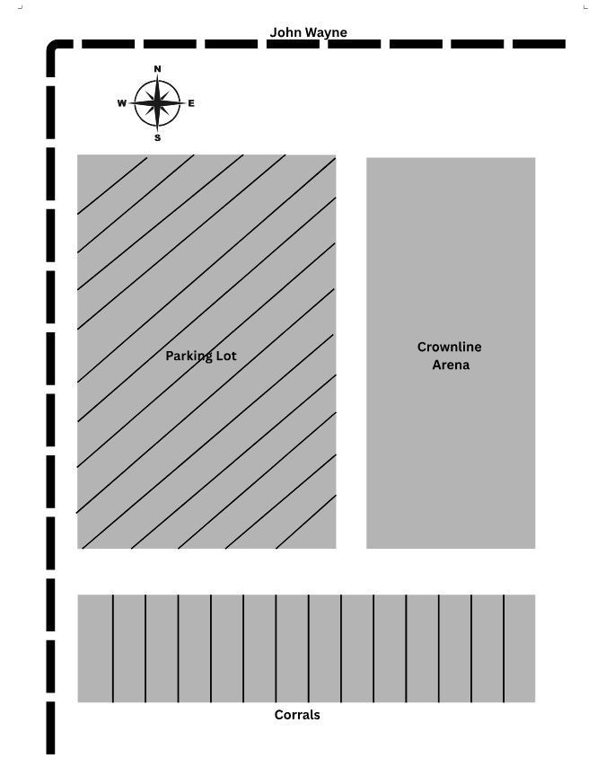 Top-down view of a grounds layout, showing parking area, arena building, and corrals.