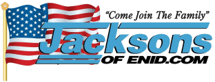 A logo for jacksons auto family , a car dealership.