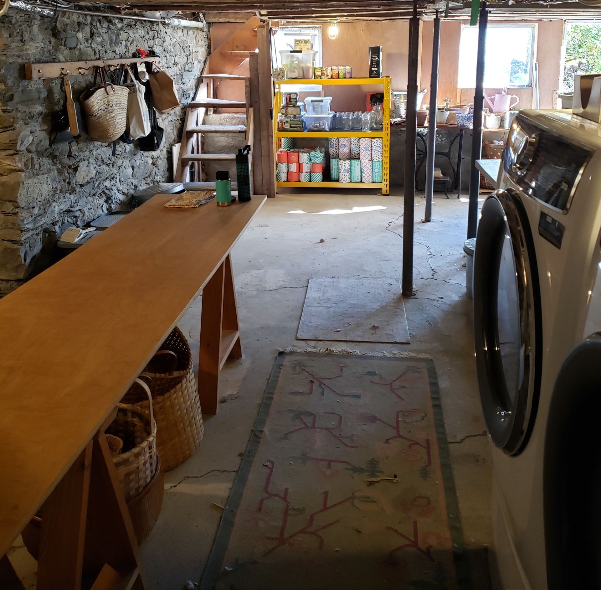 A laundry room with a washer and dryer in it