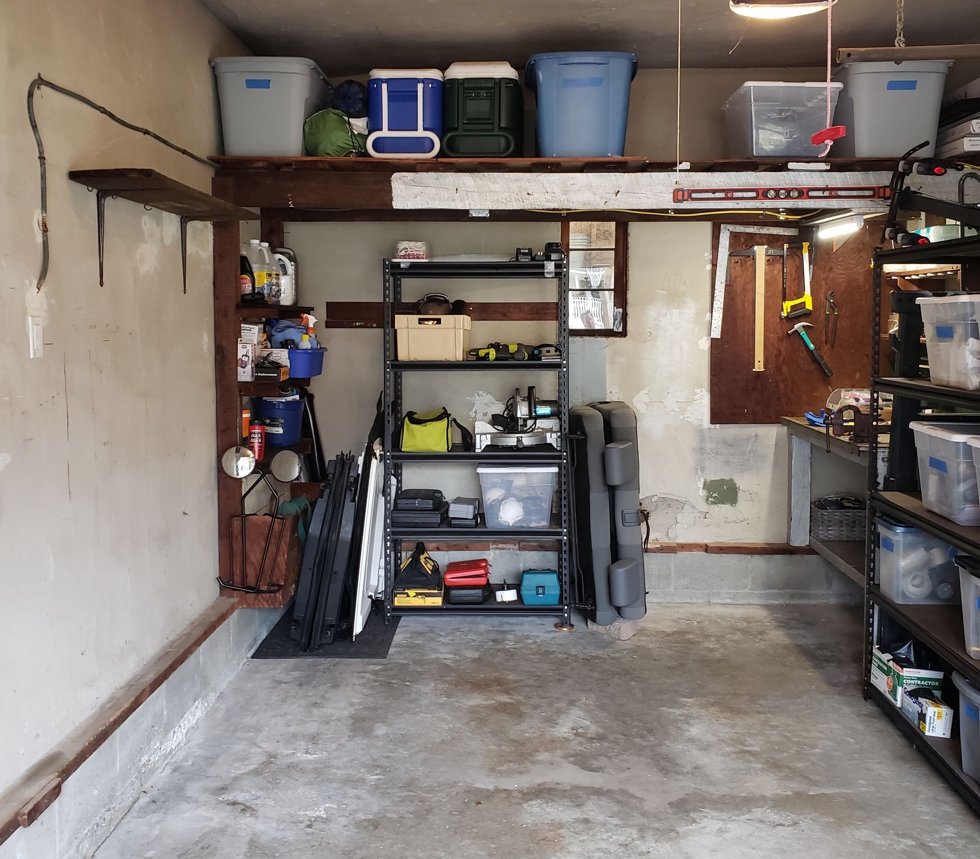 A garage filled with lots of shelves and boxes