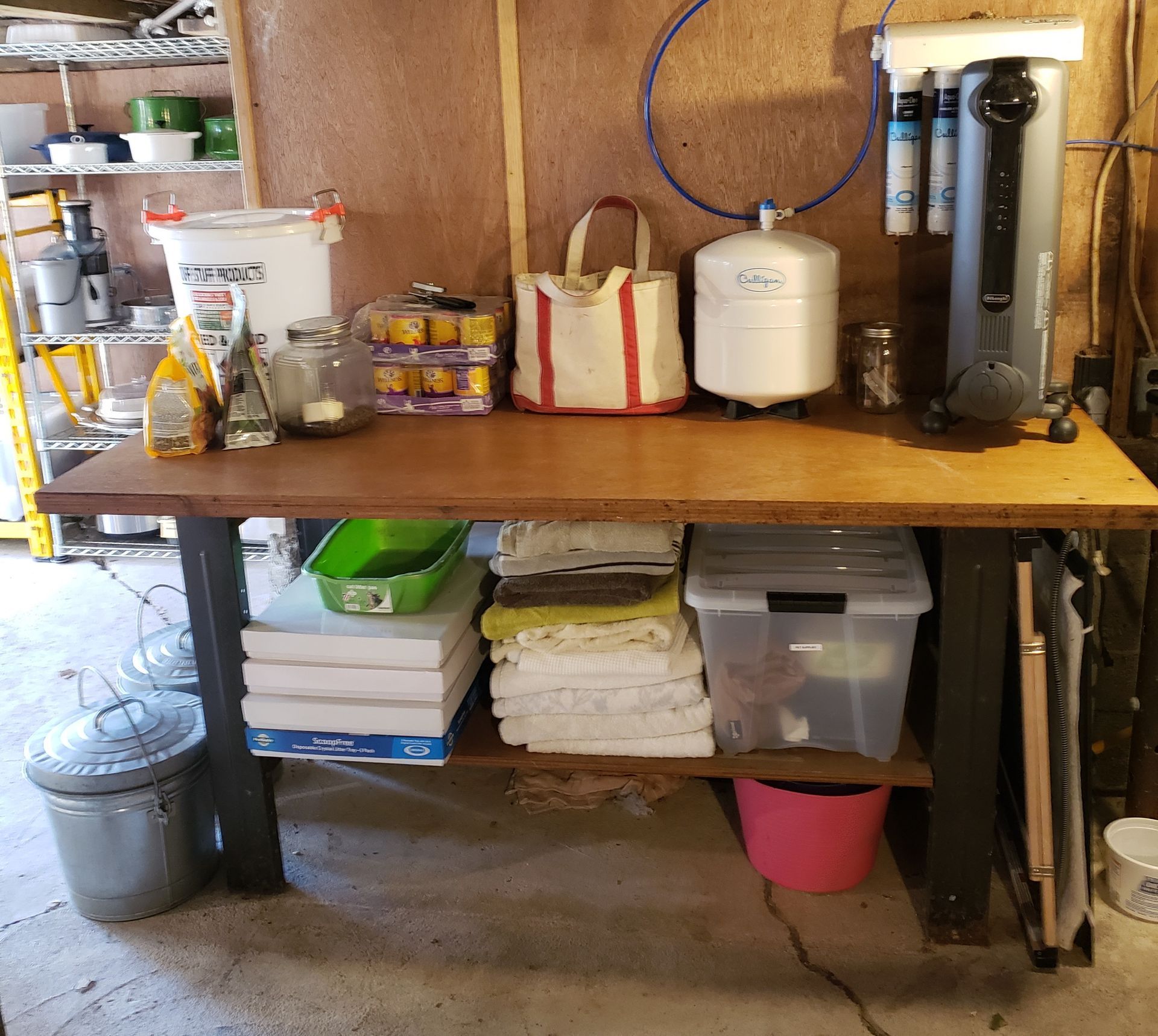 A wooden table with a bunch of items on it