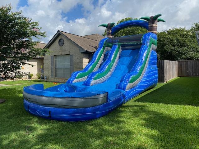 Inflatable Rentals — Little Girl Going Down in Water Slide in Air in Deer Park, TX