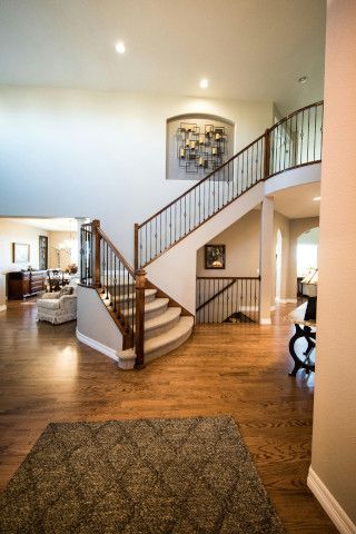 Bannister near a generic coil, patio, and sliding door.