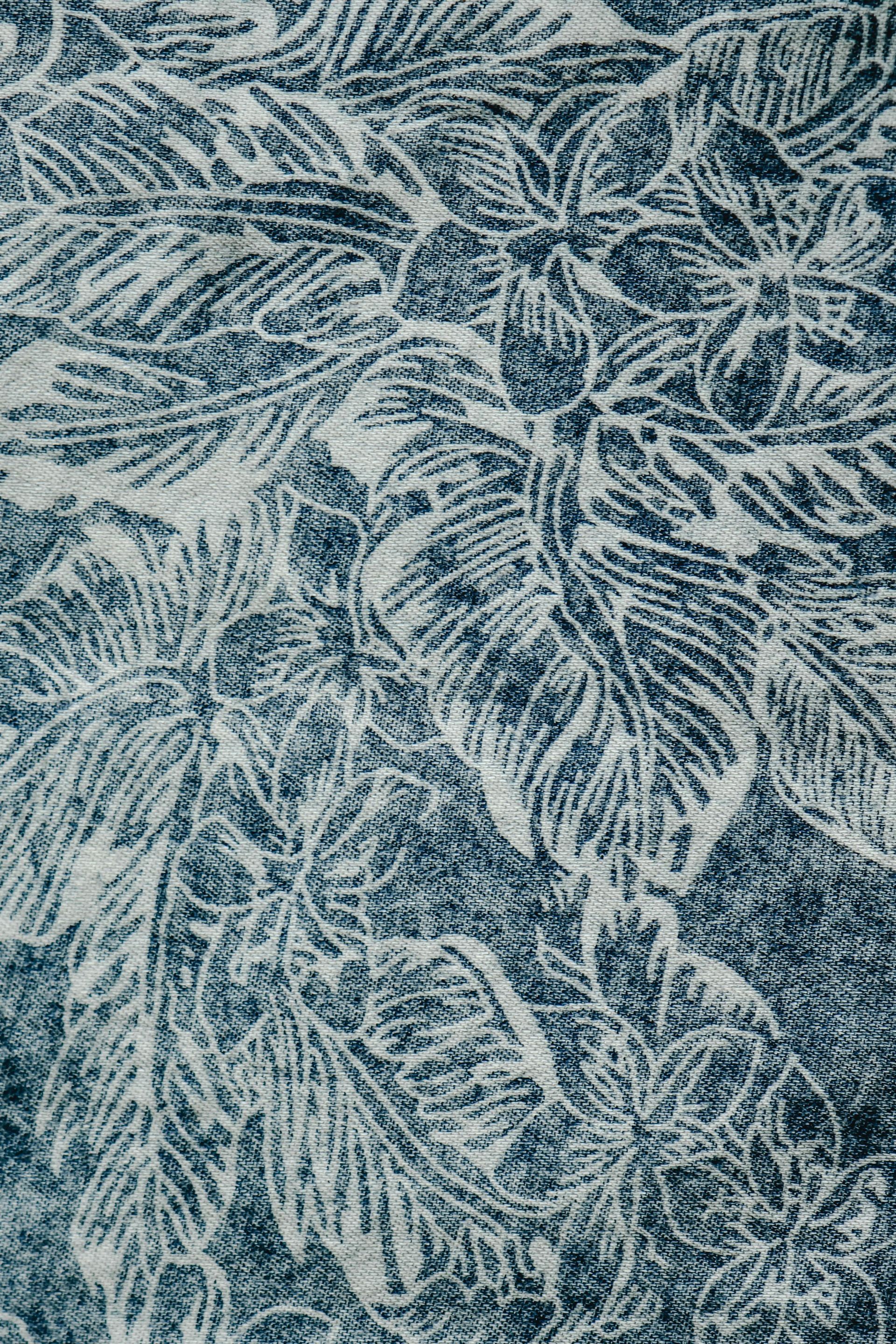 Floral wallpaper in blue and white, close-up