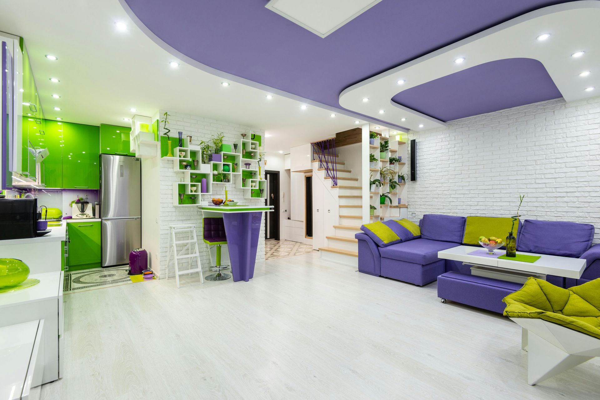 A colourful kitchen in Sunderland with green and purple finish, painted by Foxglove Decor.