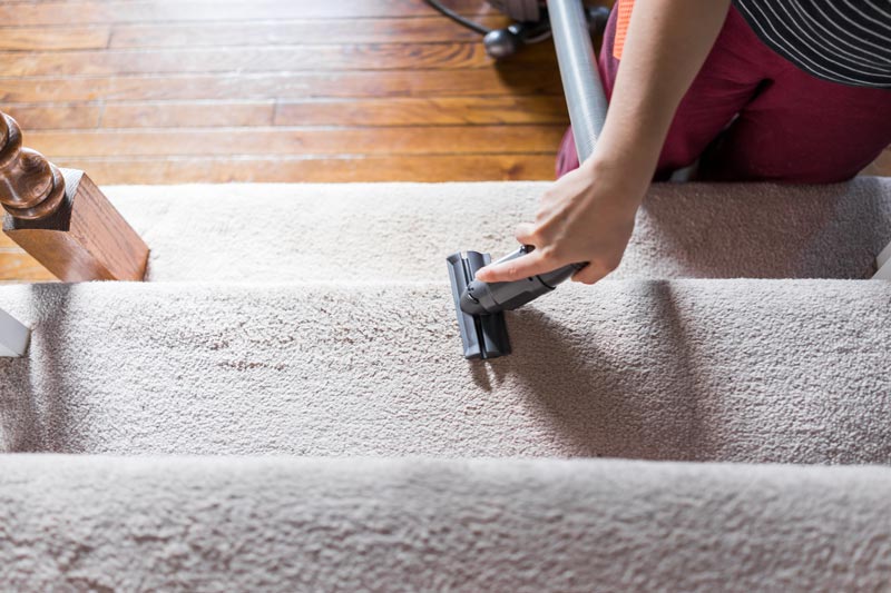 Woman Vacuuming Carpet — Fredericksburg, VA — All Star Carpet Cleaning
