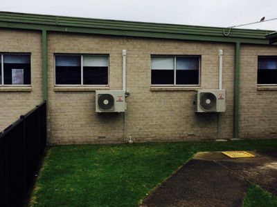 Two Air Conditioners Outside House — Steve’s Air Conditioning in Shellharbour, NSW