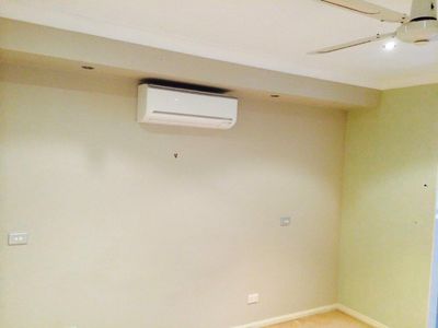 Air Conditioner Installed On Wall — Steve’s Air Conditioning in Shellharbour, NSW