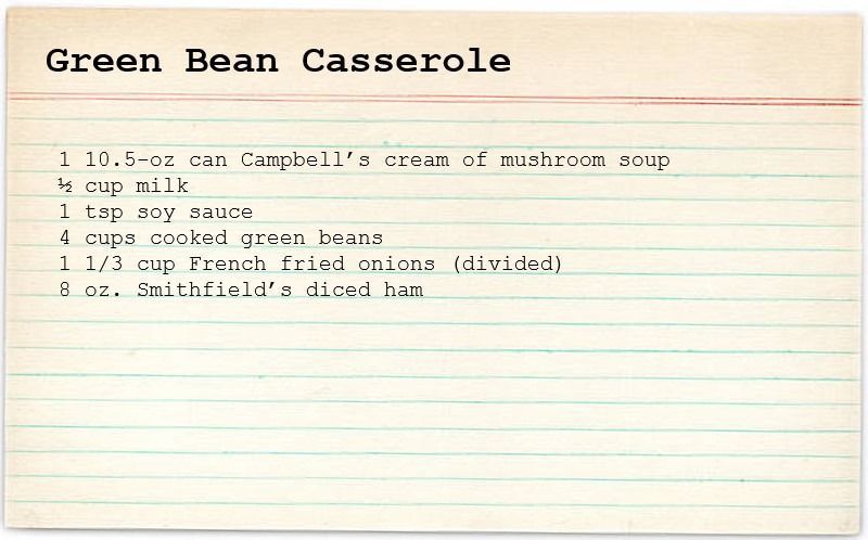 A recipe for green bean casserole is written on a piece of paper