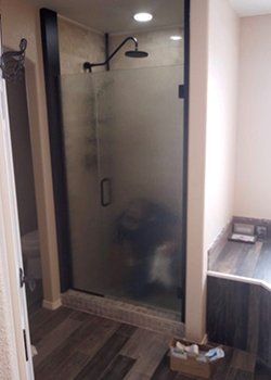 Residential Glass Services — Handyman Installing Glass Door in Portales, NM