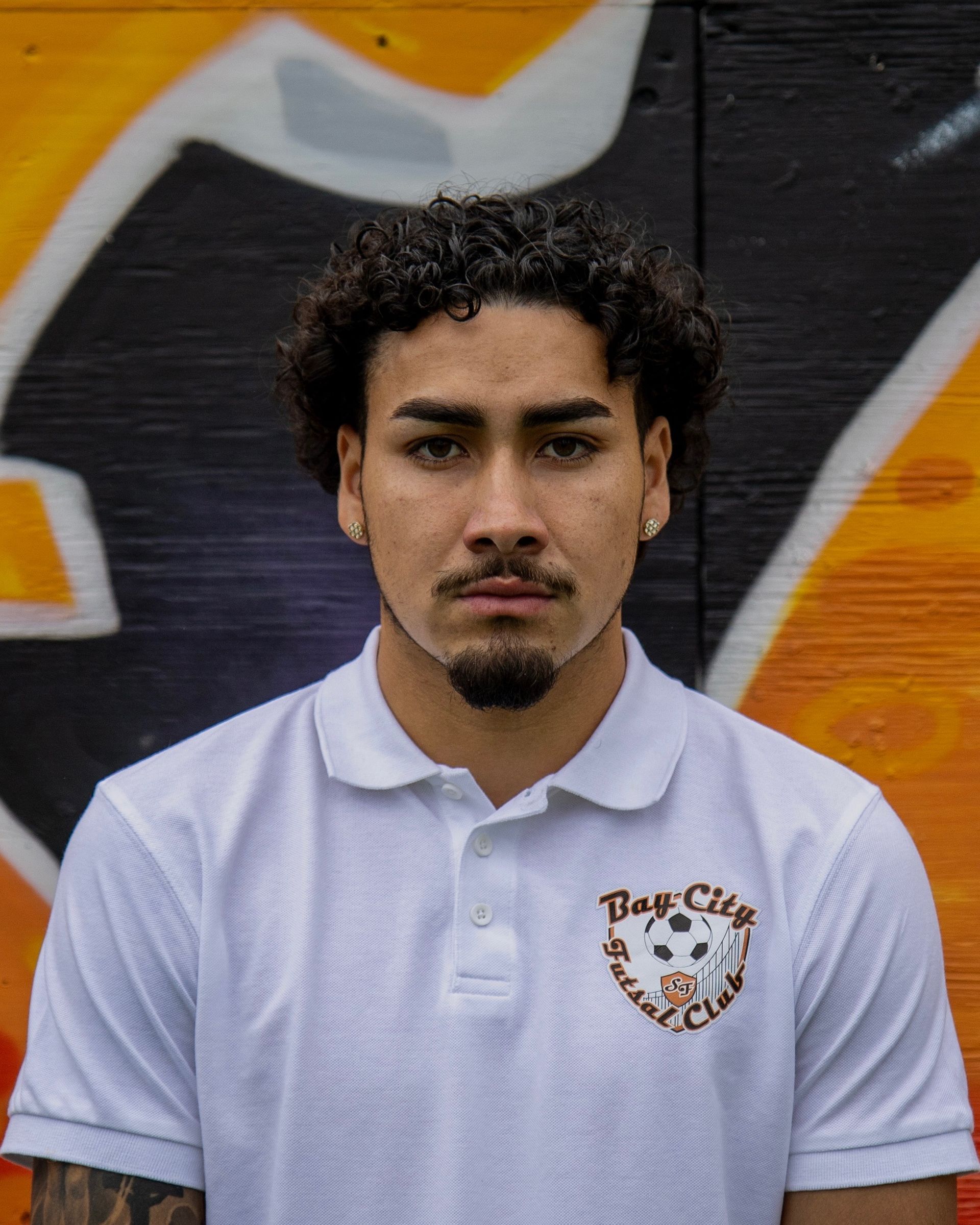 Uiliam Garduno, Man in white polo shirt with 