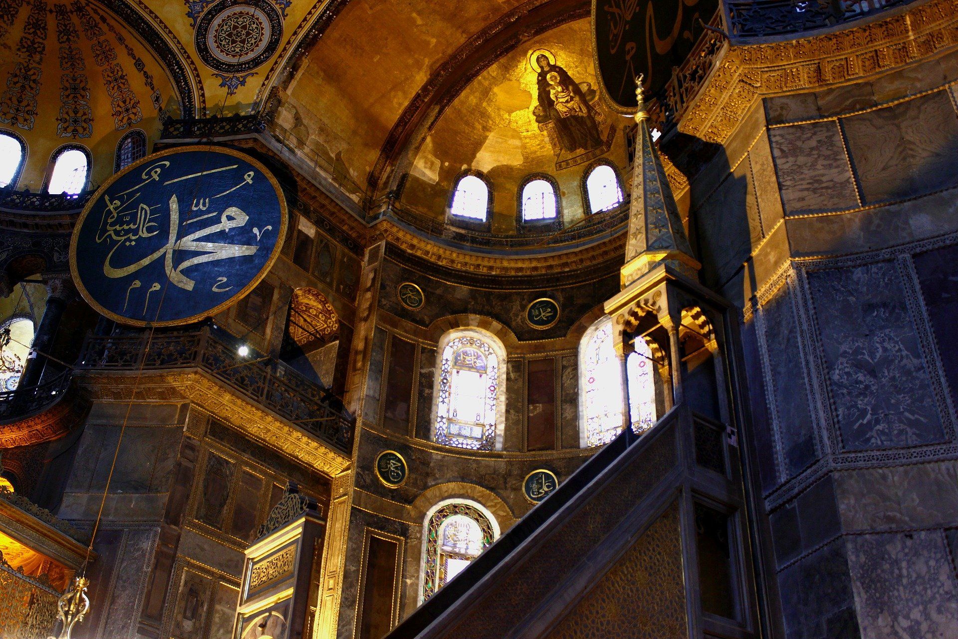 The inside of a building with a dome and stairs, Hagia Sophia Mosque