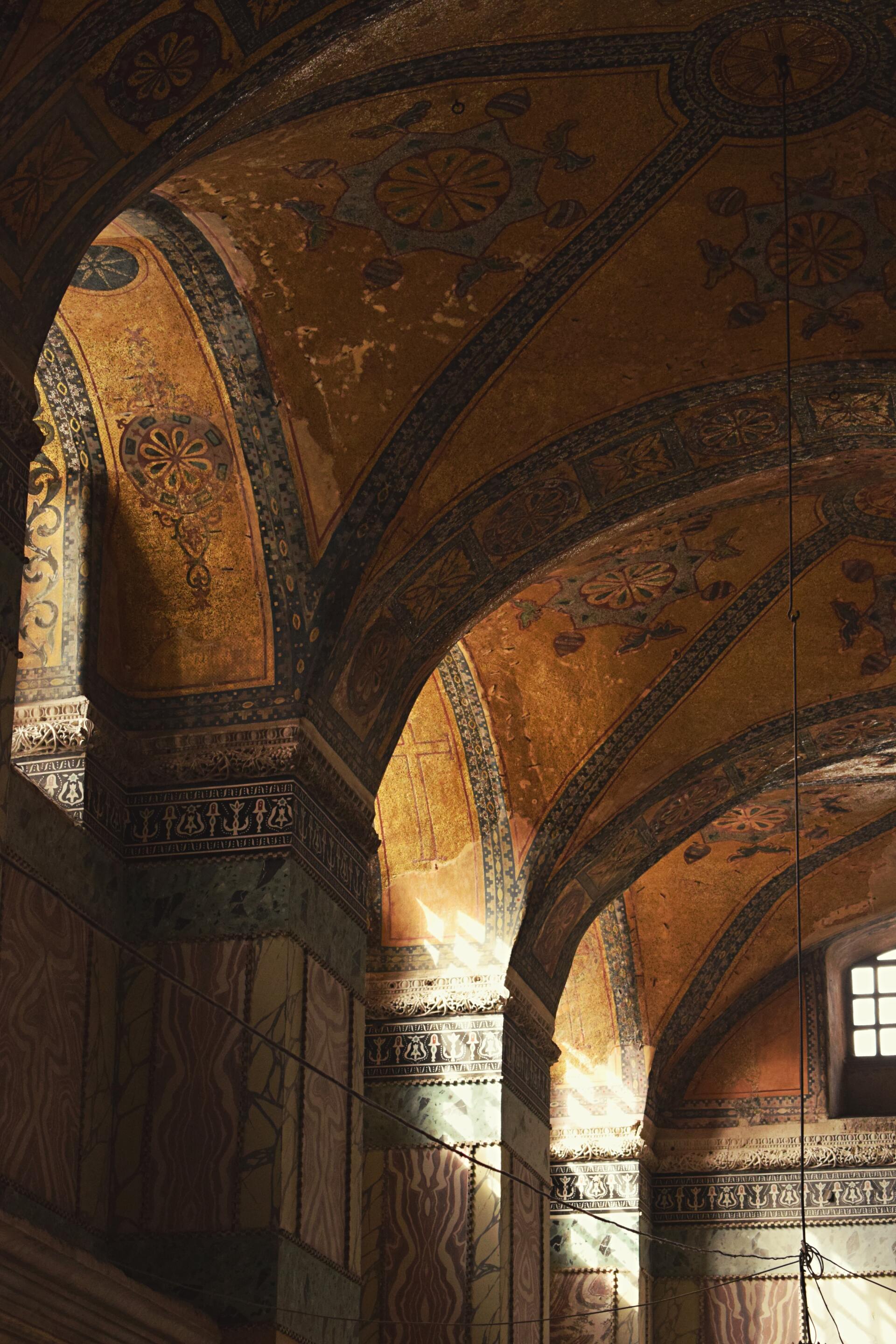 A church with a very ornate ceiling and pillars