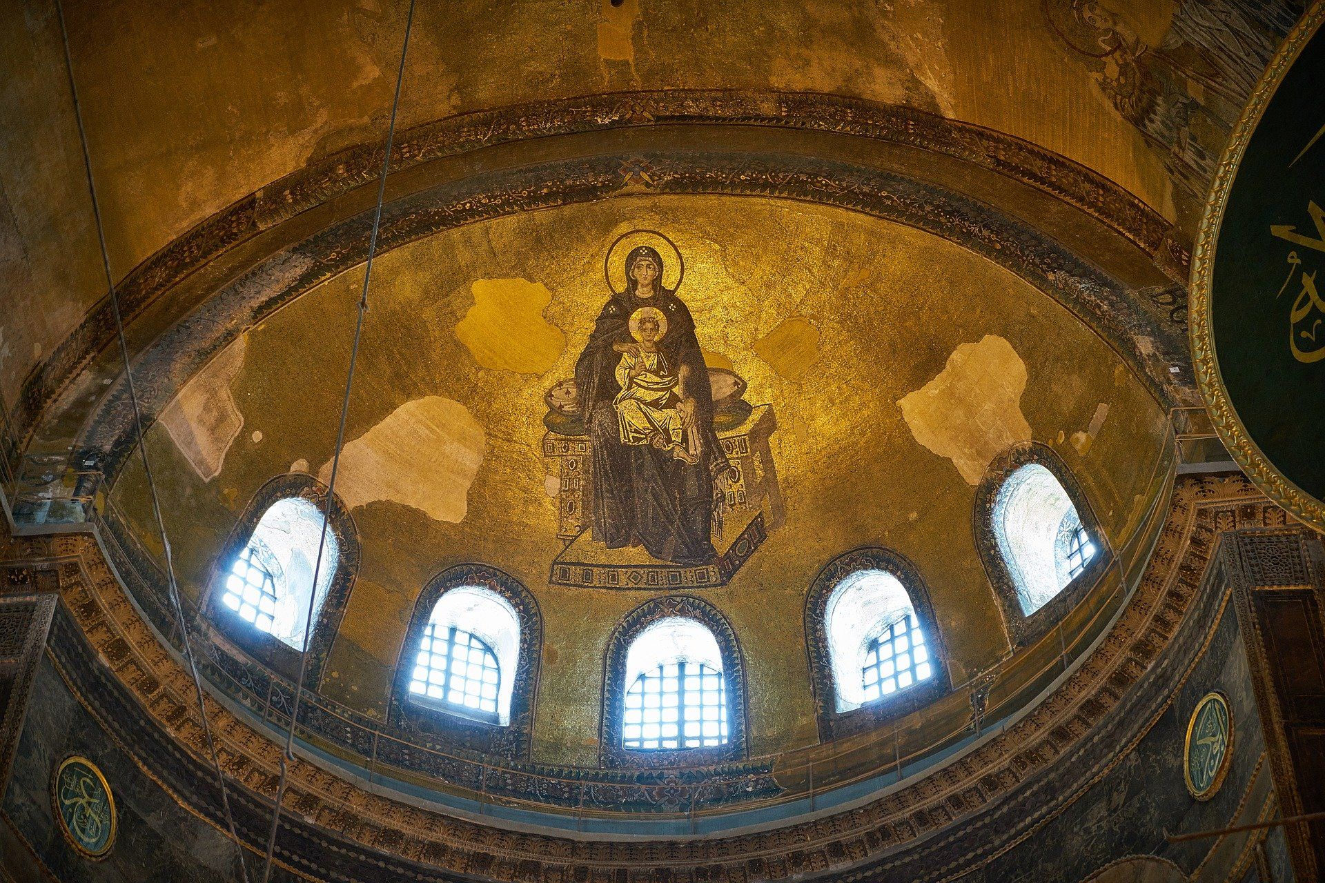 Hagia Sophia, A mosaic of a woman holding a baby jesus in a church.