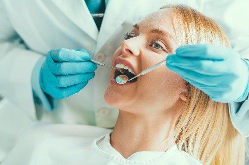 gums hurt after dentist visit