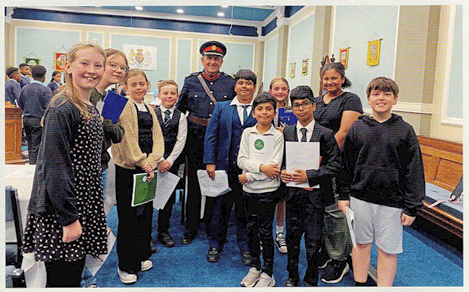 Picture showing High Sheriff with winning school Whittaker Moss Primary  in Rochdale