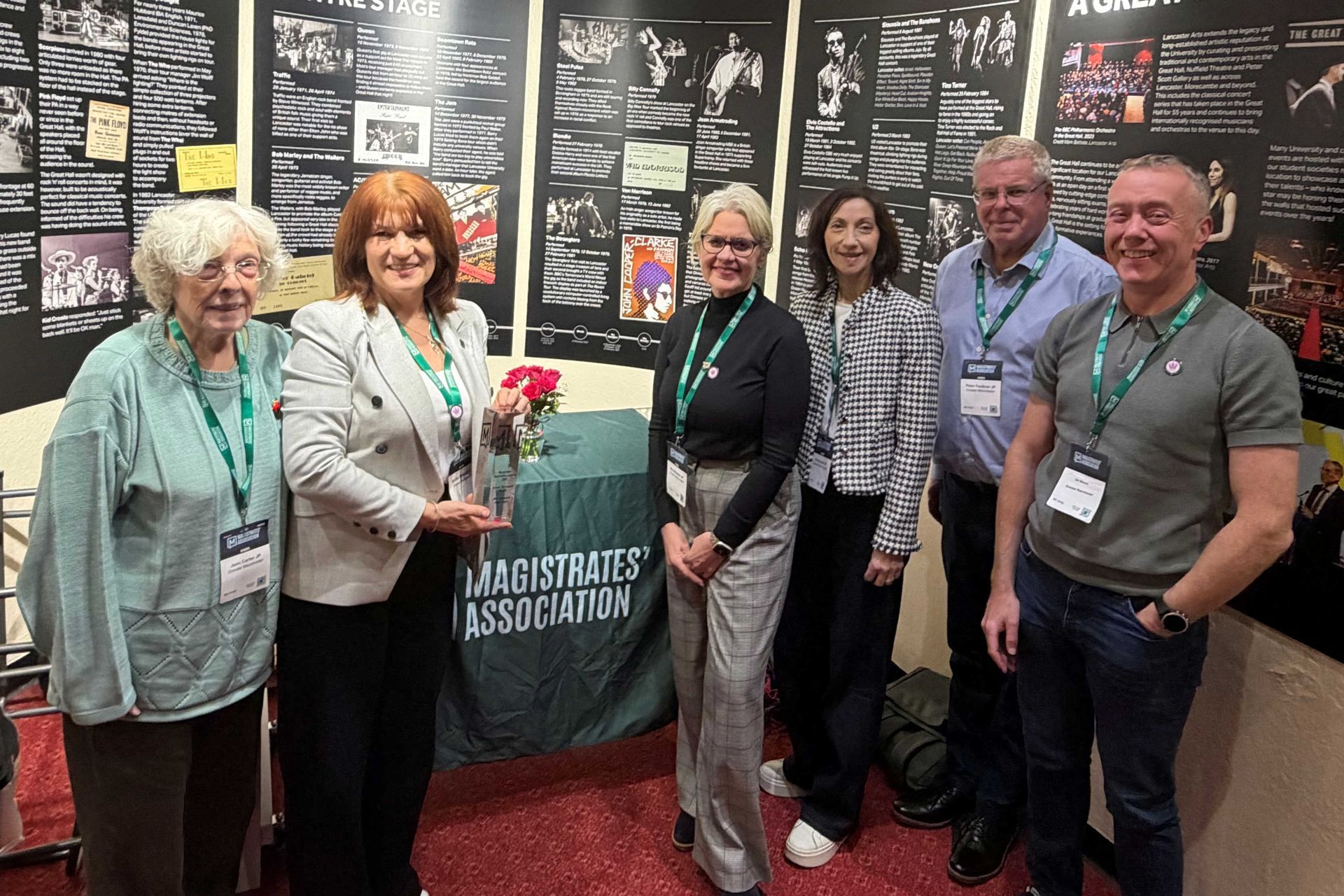 Picture showing some of the GM MIC team at the conference, with the award