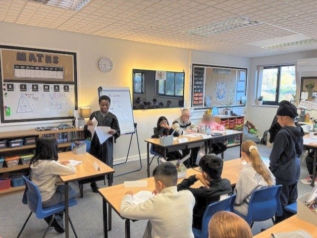 Students performing the mock trial