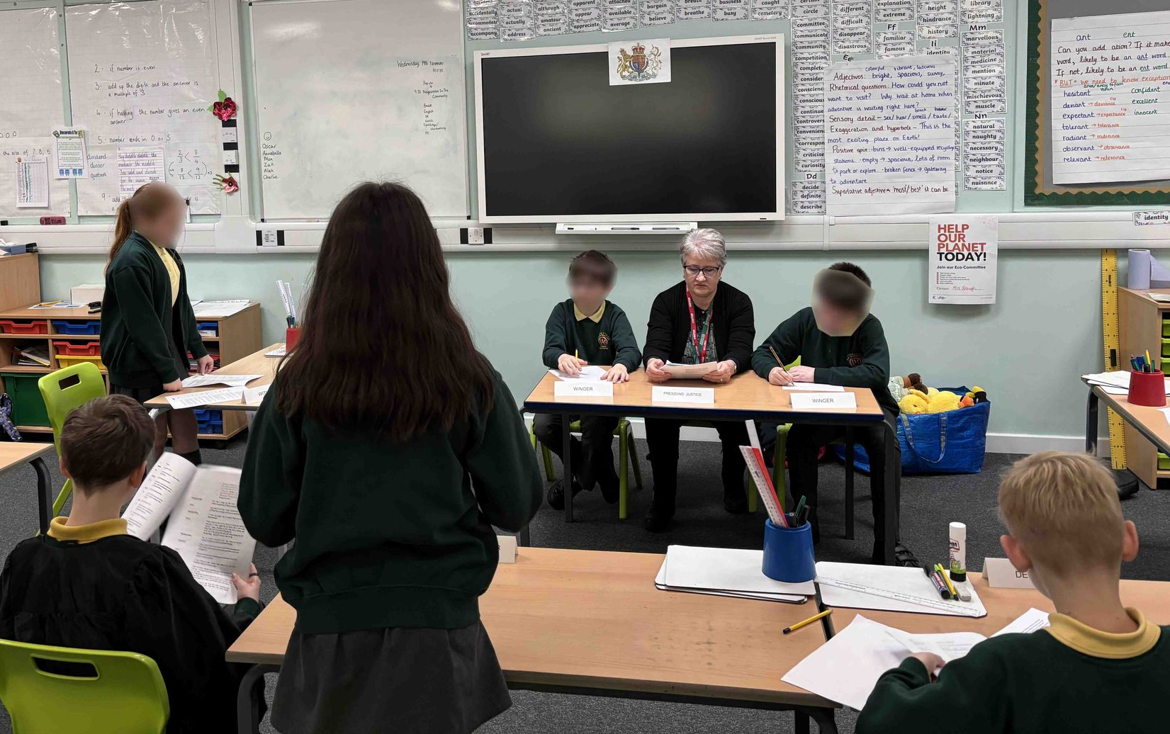 Picture of students during a mock trial in the class room