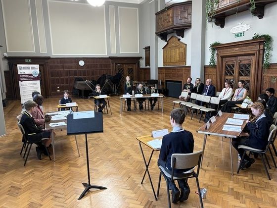 A mock trial under way within the Hallam Hall. ©2026 Stockport Grammar School
