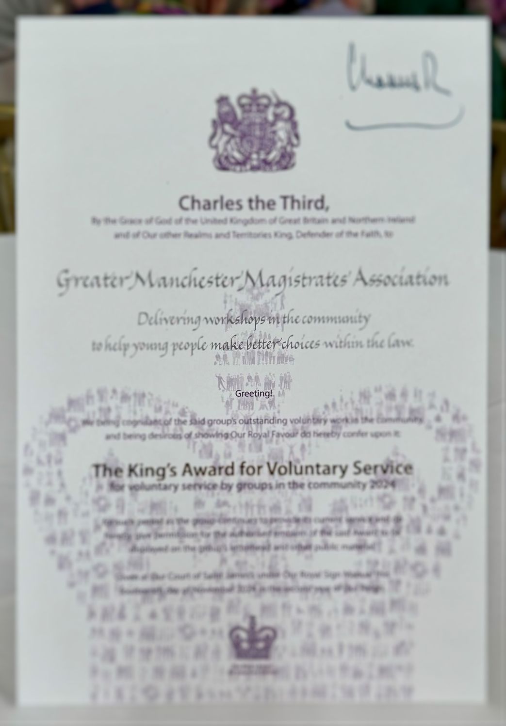 The citation, signed by His Majesty The King.