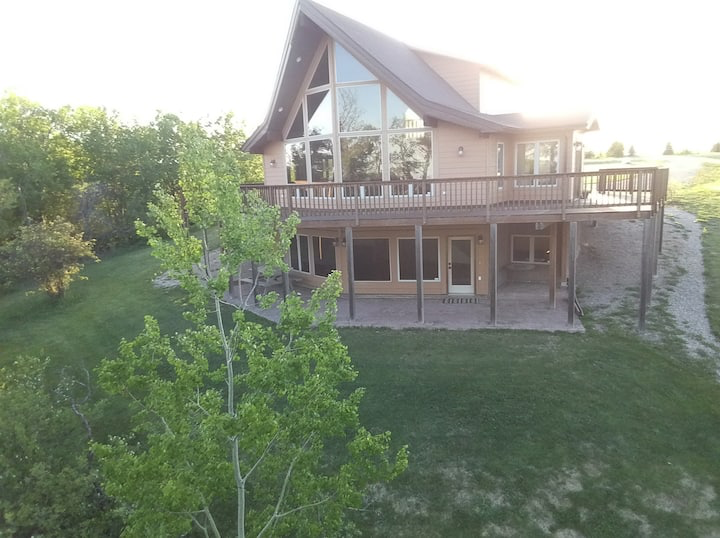 An aerial view of a large house with lots of windows