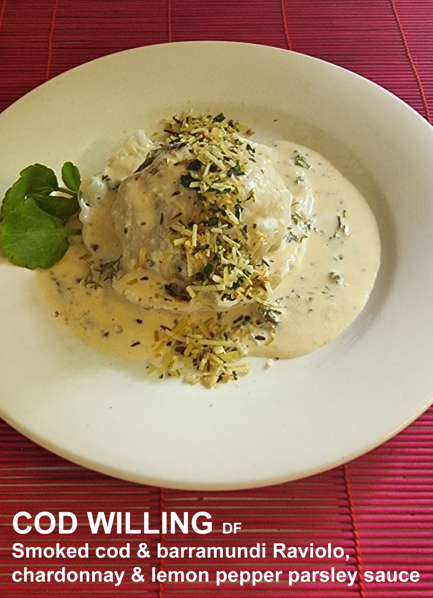 A white plate Topped with Smoked cod and Barramundi ravioli  — Wayne & Adele's Garden of Eating BYO Restaurant In South Townsville, QLD