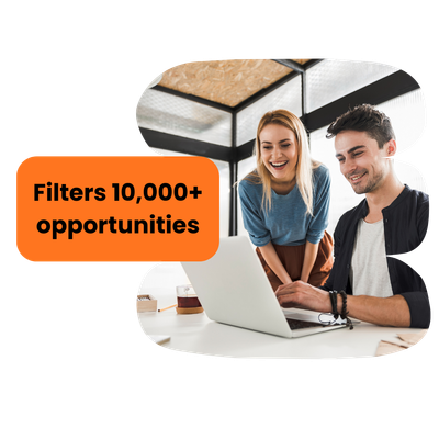 Two people smiling at a laptop, orange text reads
