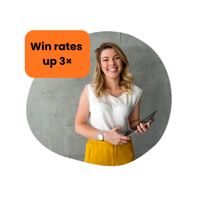 Woman smiling, holding tablet, set against a gray wall, with orange text: