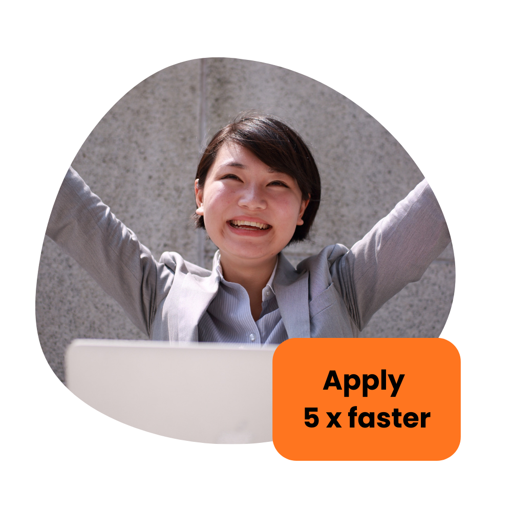 Woman in suit celebrates near a laptop, arms raised. An orange box says 