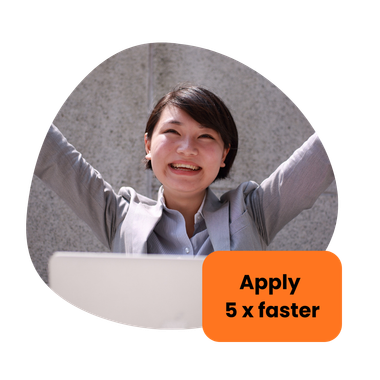 Woman in suit celebrates near a laptop, arms raised. An orange box says 