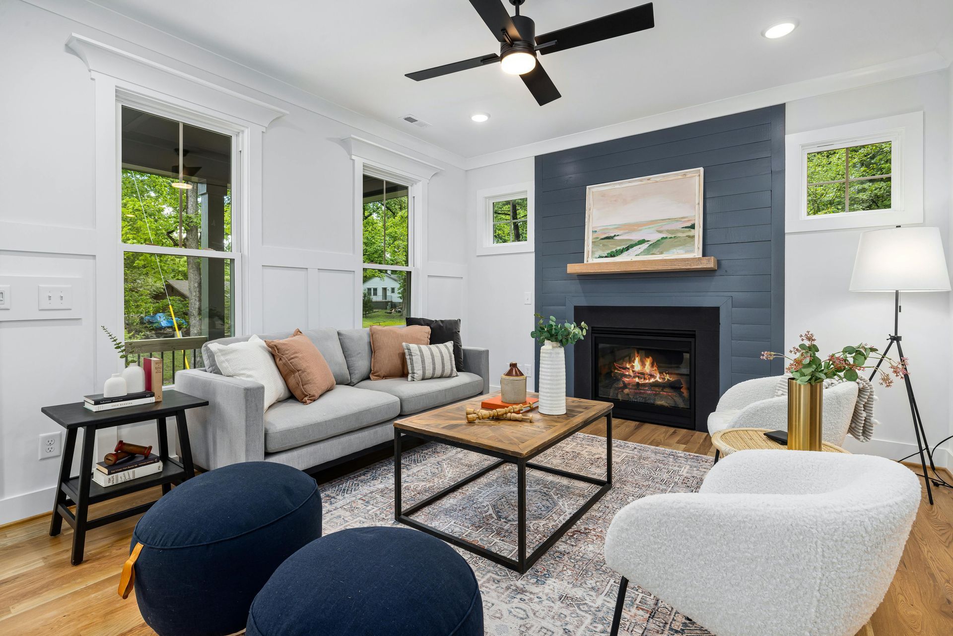 Living room with slate blue accent fireplace in Hampton Roads VA