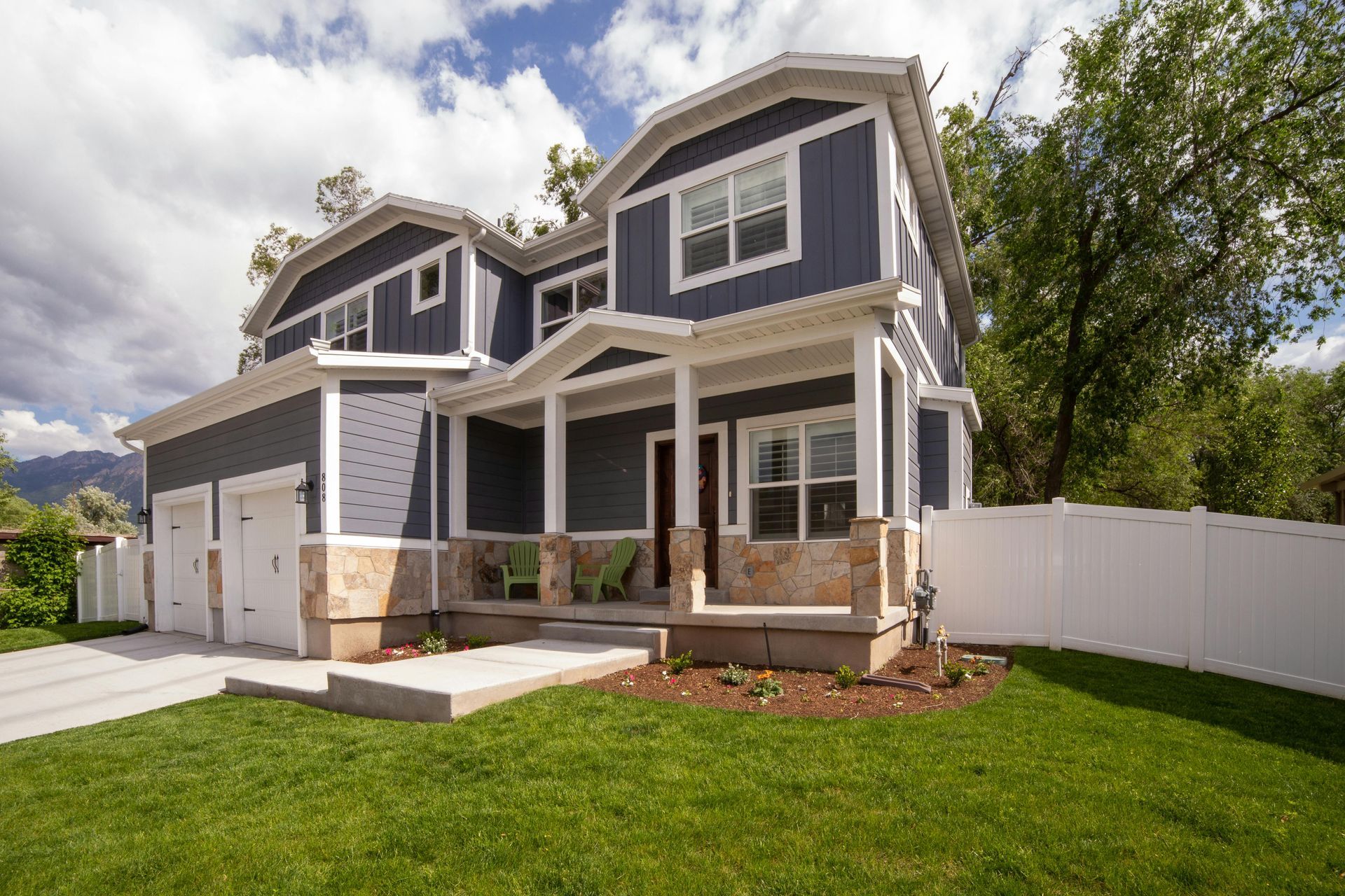 slate blue home with board and batten siding and white trim in Hampton Roads VA
