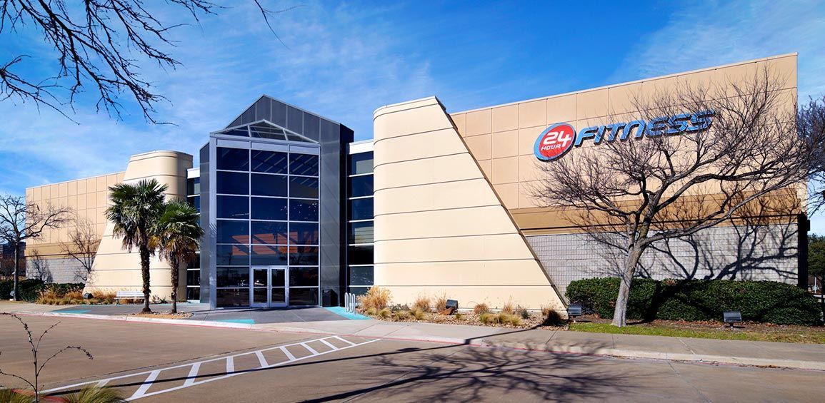 Exterior view of a modern building with the logo 