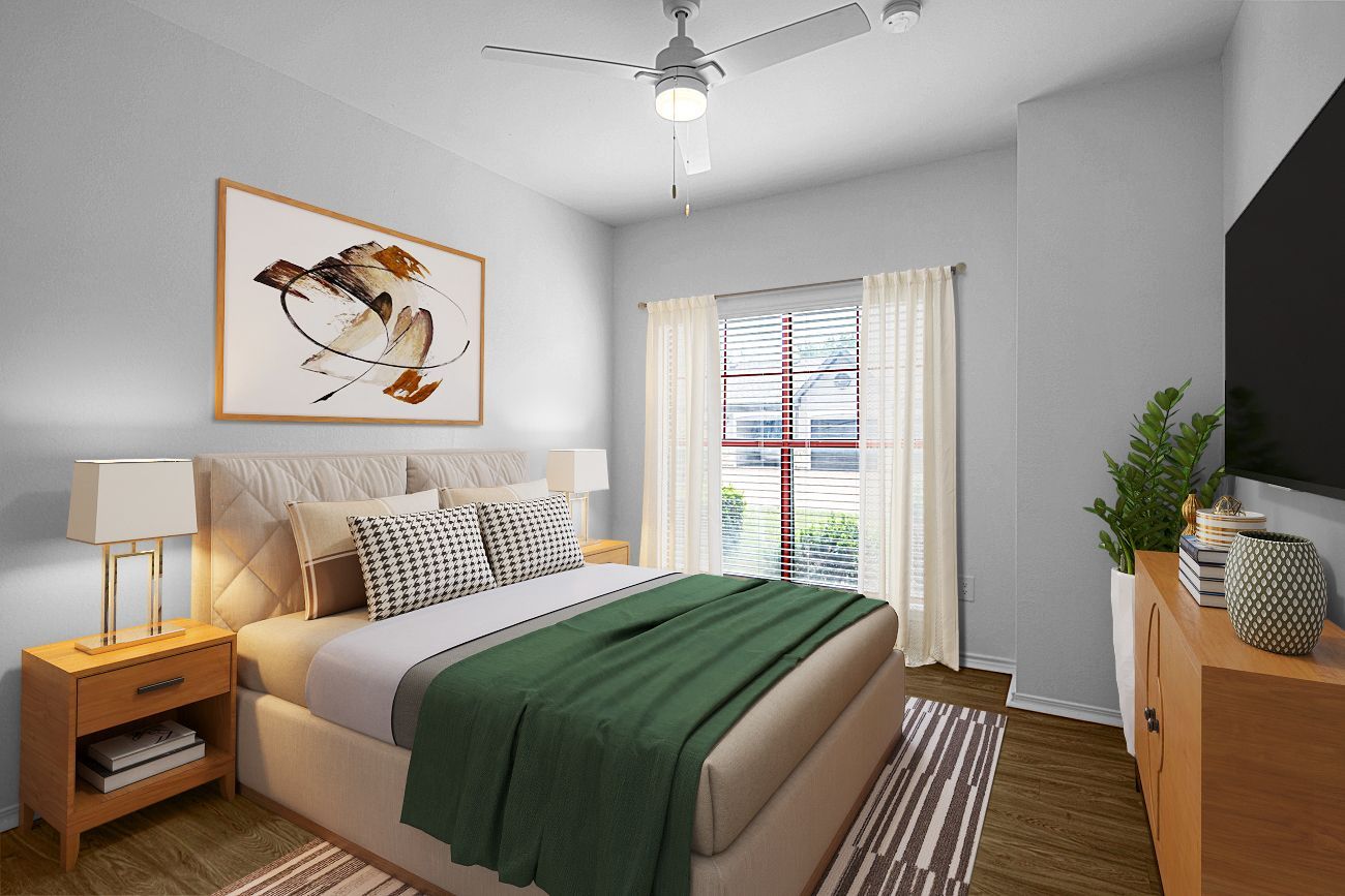 Bedroom with a bed, nightstands, and window. The room has gray walls, a green blanket, and a large painting above the bed.