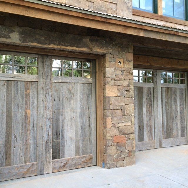 wood and glass garage door on stone mountain housee