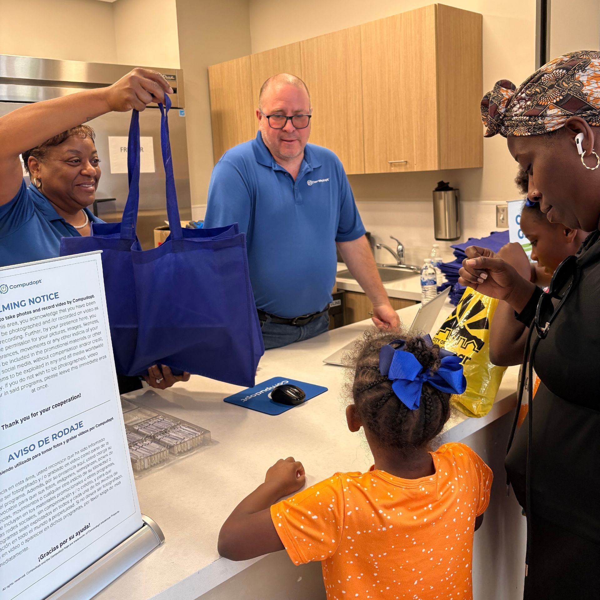 community organizations in Goodyear, AZ team up with Compudopt to distribute computers to families