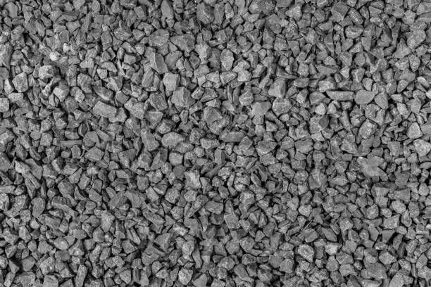 A black and white photo of a pile of gravel.