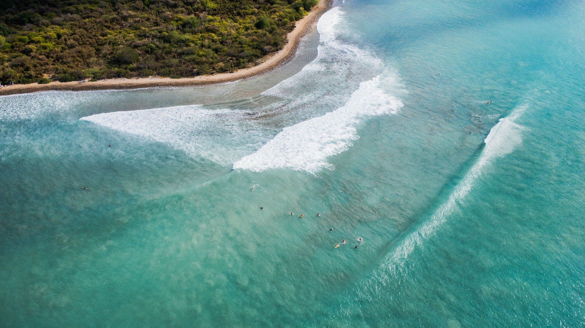 Aerial view of surfers at Anse des Peres at Saint-Martin