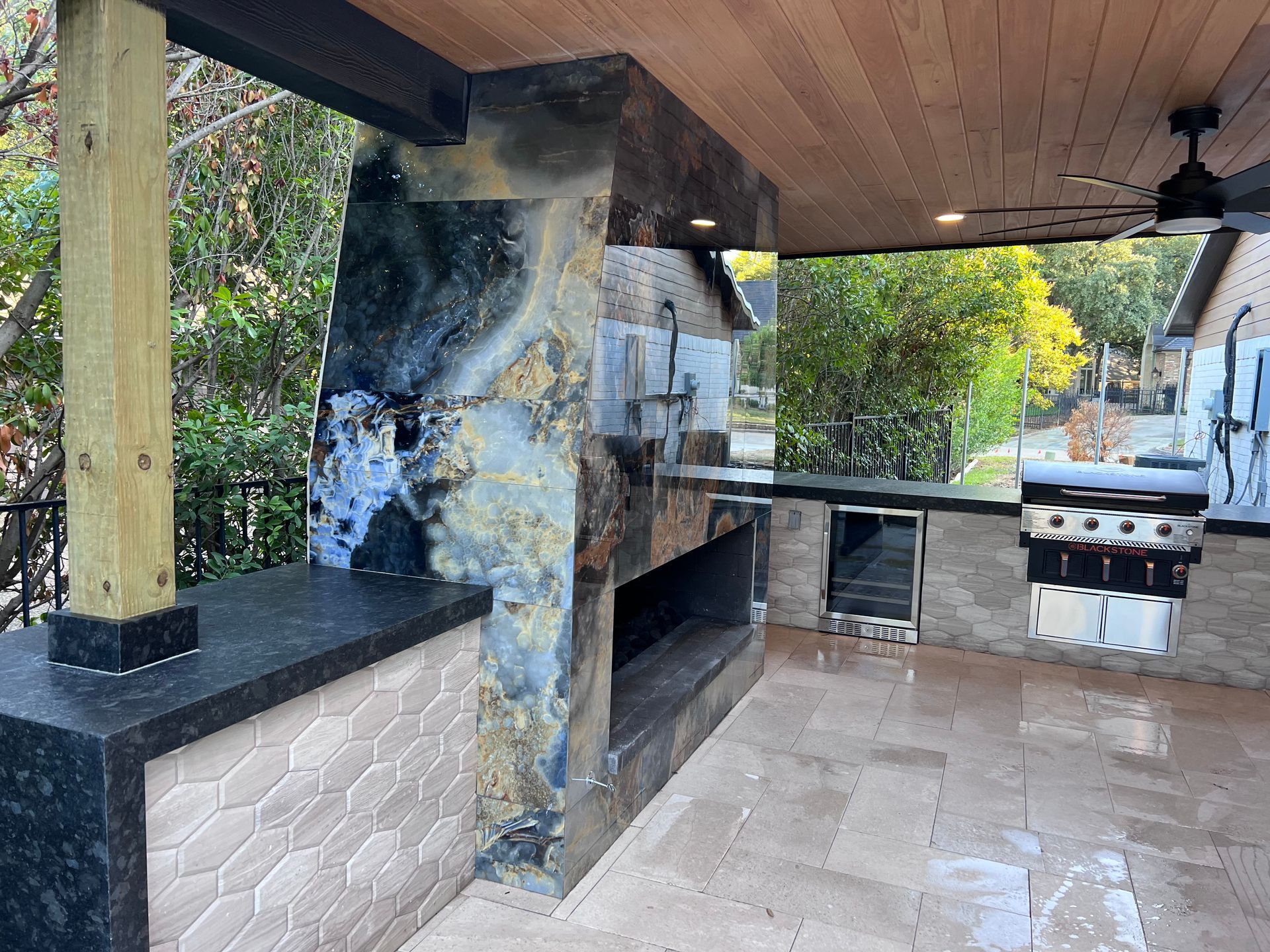 There is a fireplace in the middle of the room.