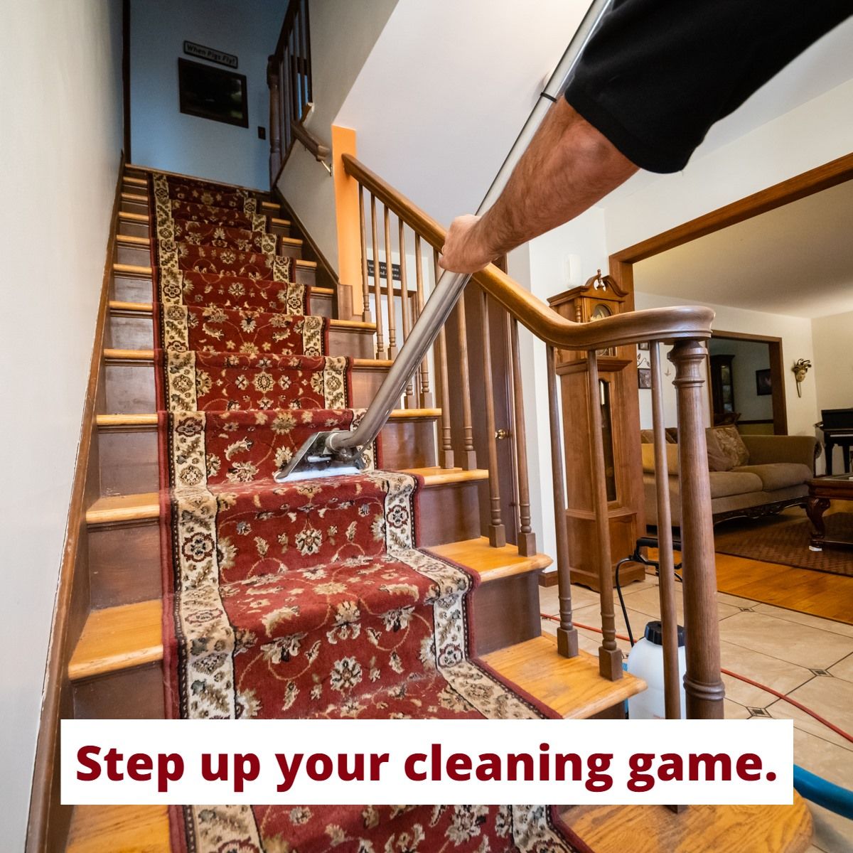 a person is using a vacuum cleaner to clean the stairs