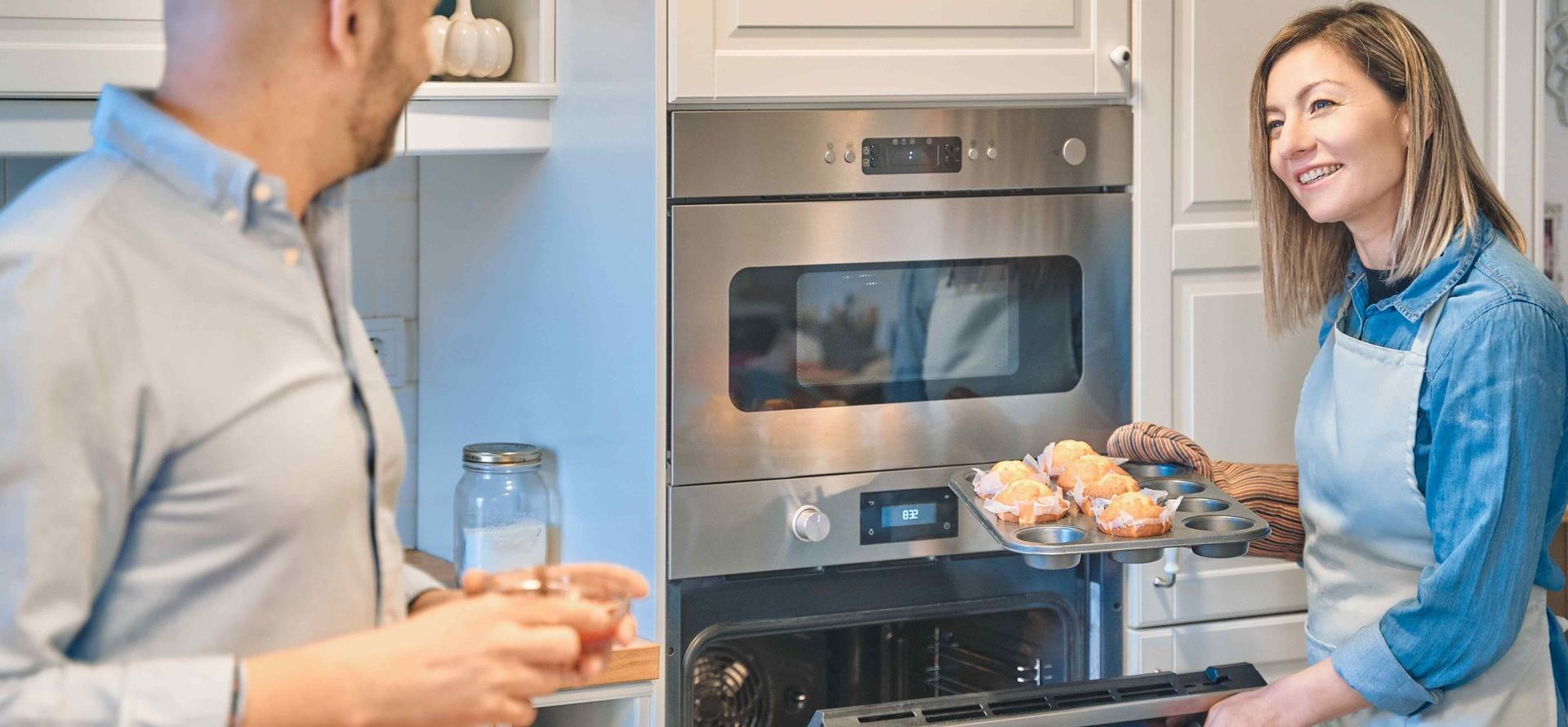 Couple Cooking At Home With Energy Star Appliances