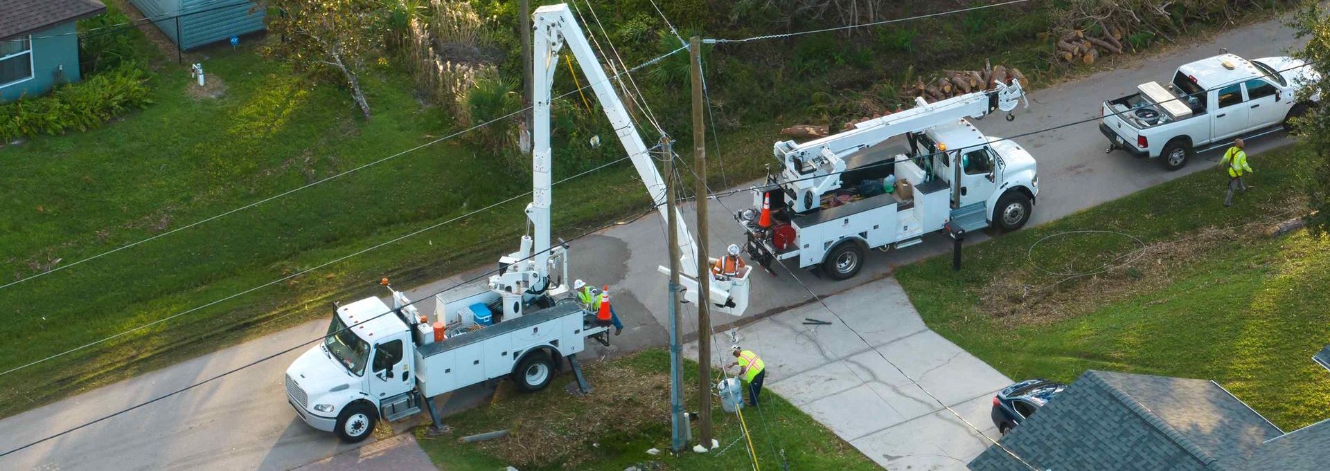 Electricians Repairing Damaged Powerlines