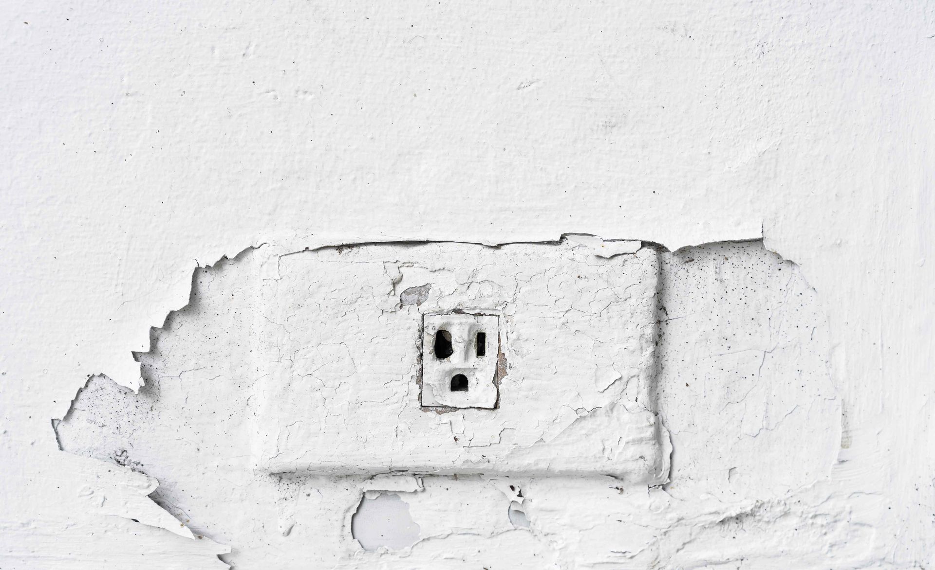 Old Electrical Outlet In Need Of Replacement and Affordable Electrical Rewiring