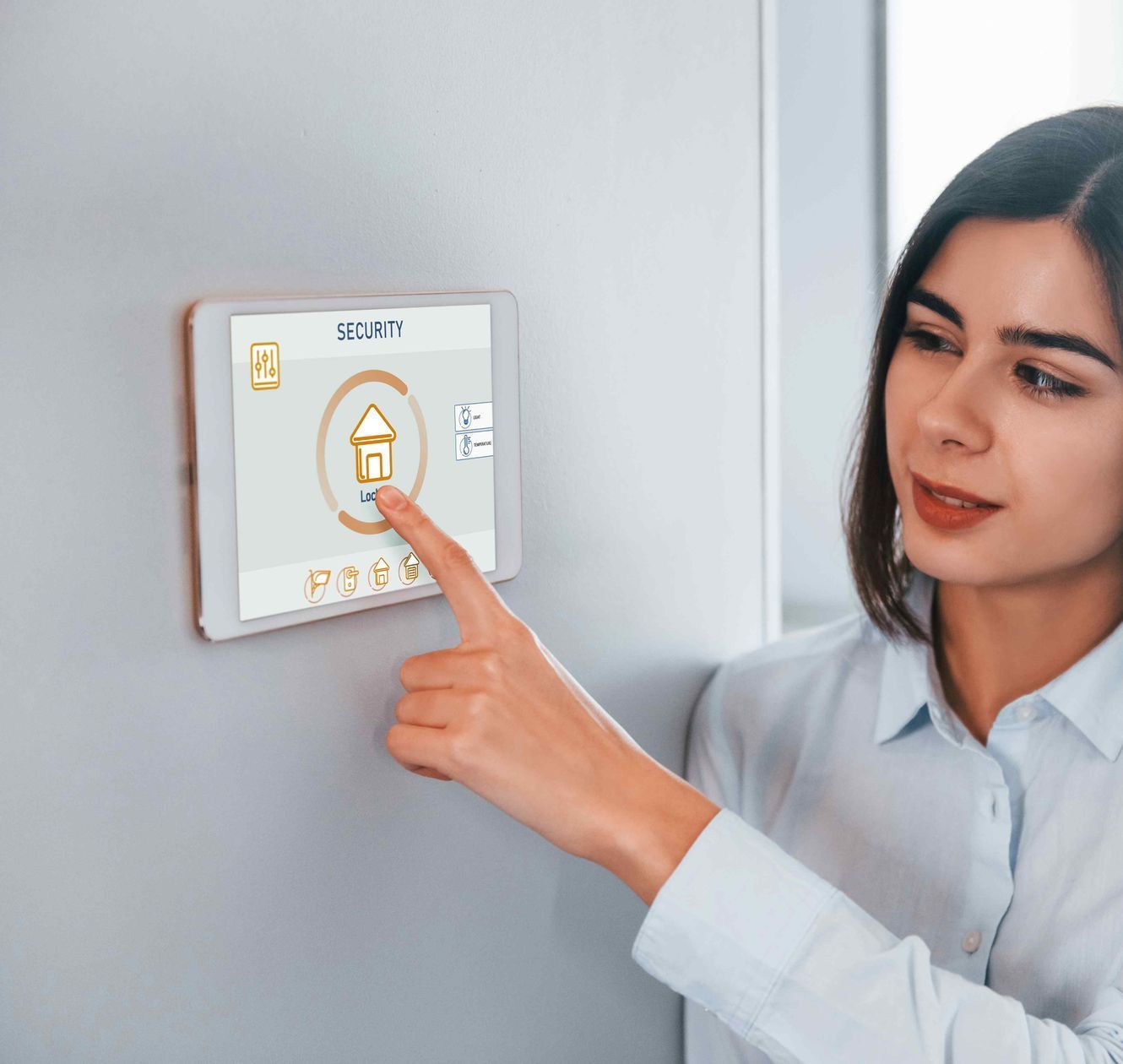 Woman Setting Affordable Smart Home Security