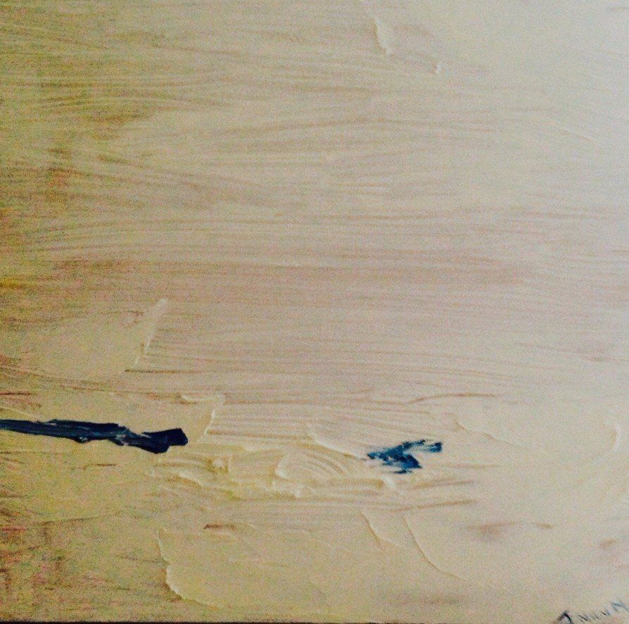 A close up of a piece of wood with the letter a on it